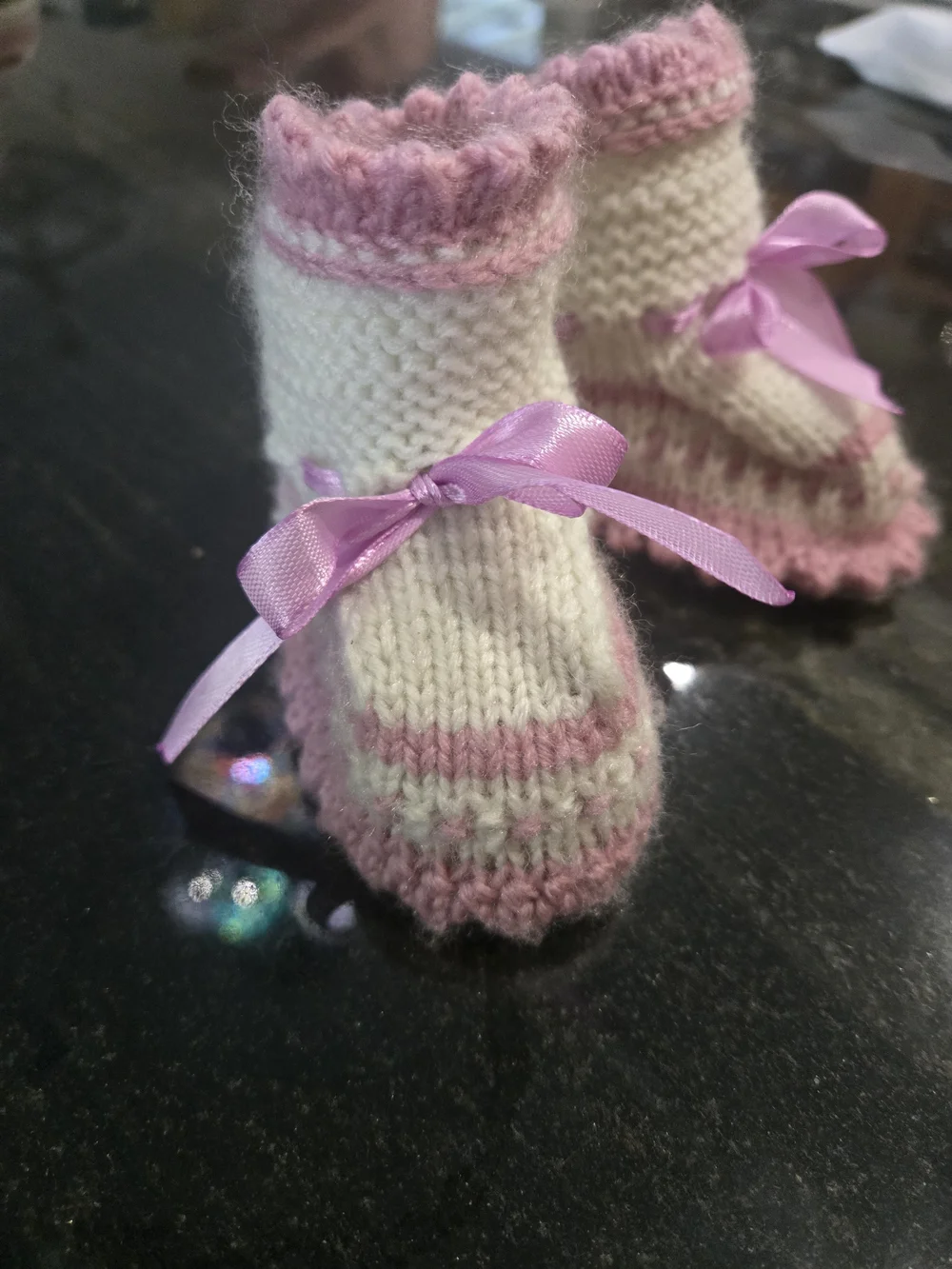 Soft Knit Baby Slippers with Pink Ribbon Accent
